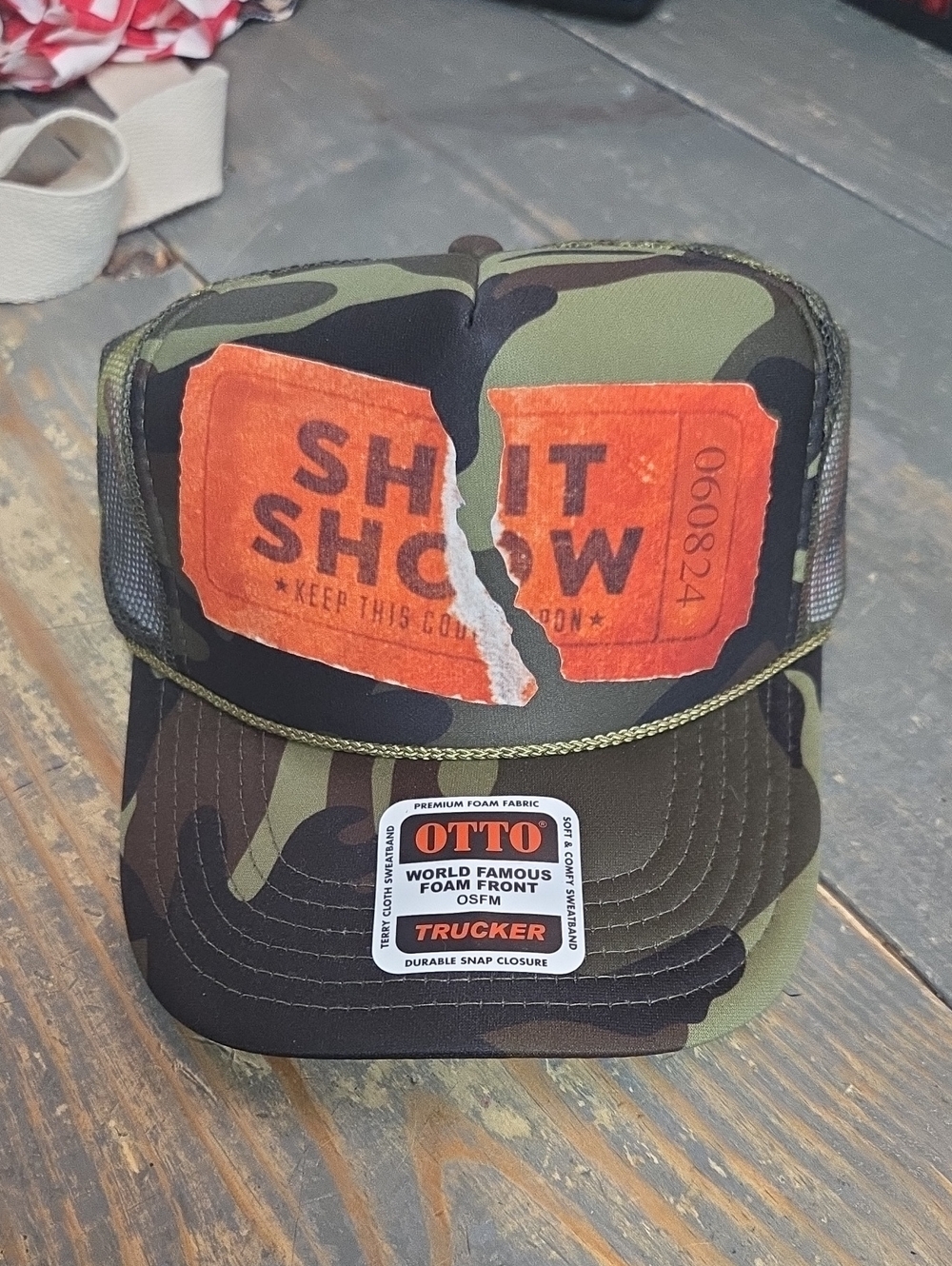 OTTO Camouflage Trucker Hat with Torn Shit Show Ticket